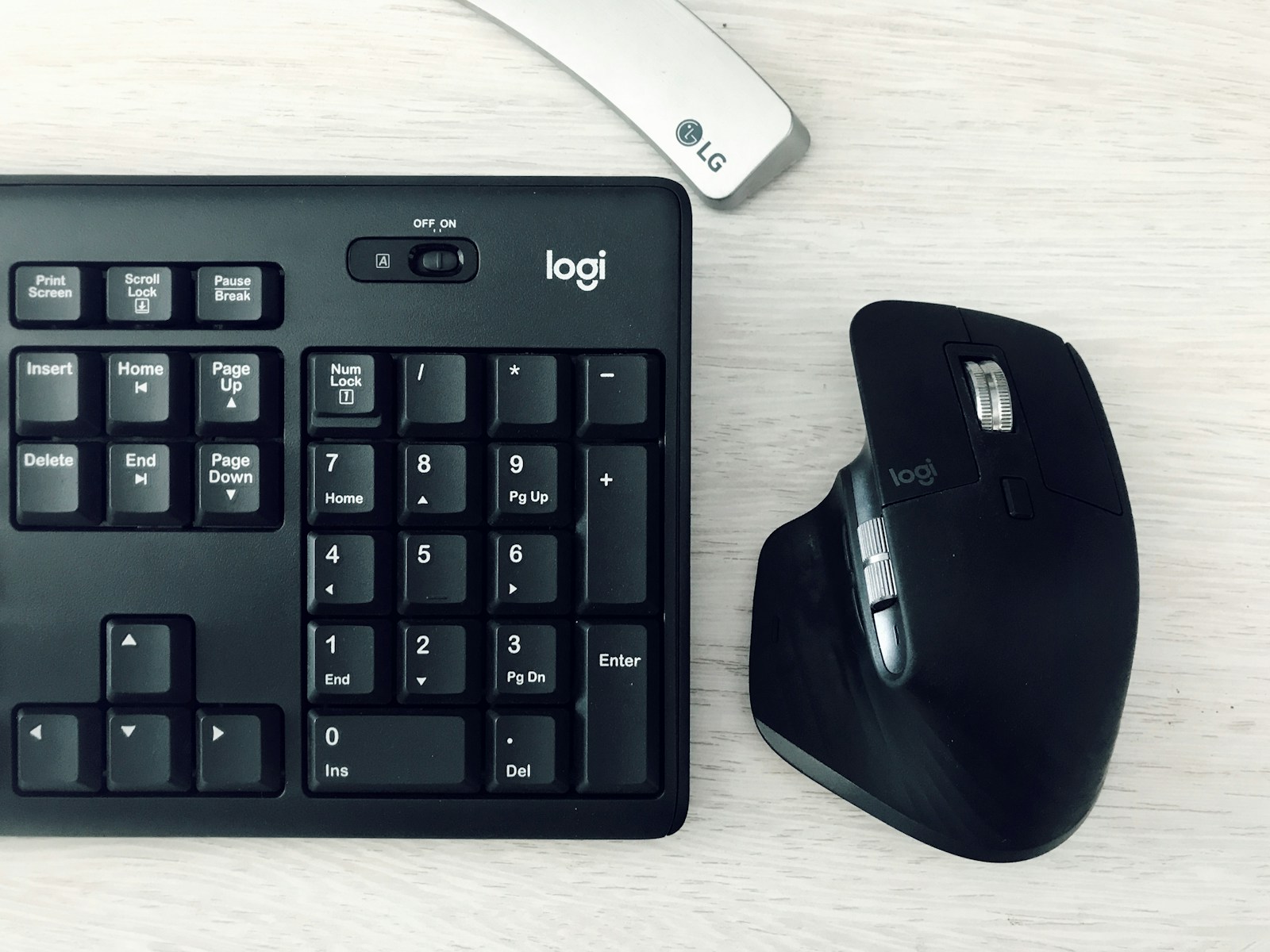 a keyboard and a mouse on a table